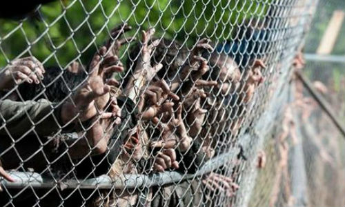 Rick's plans for a mosh pit at the prison music festival backfired when the walkers got a little too much into it (image via comicsalliance.com (c) AMC)