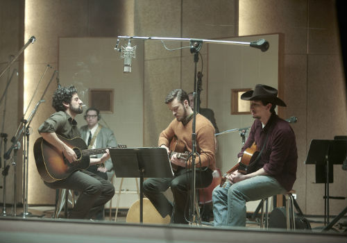 The more populist "Please Mr Kennedy" is recorded by Llewyn Davis, friend Jim Berkey and Al Cody in what some might consider a sell-out but what Davis sees as a way to earn much needed, if short term, income ((image via llewyndavis.com photo: Alison Rosa ©2012 Long Strange Trip LLC)