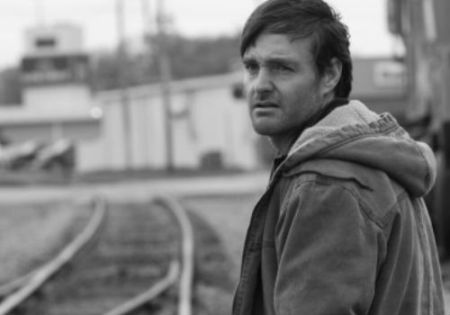 David, caught in a dead end job at an electronic store, and newly separated from his girlfriend, finds himself driving both he and his father to Nebraska, in the hope that something worthwhile will result from the time spent together (image via cinemamavine.com)