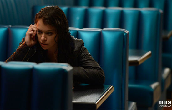 Just another relaxing night for Sarah in her local diner (image via Orphan Black official site)