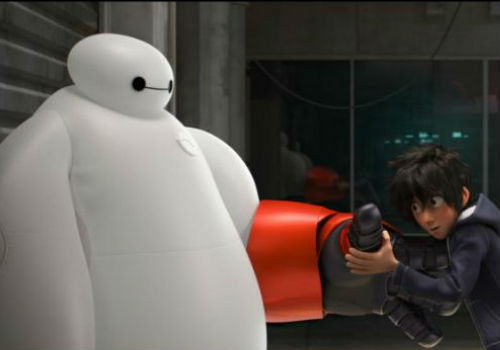 Hiro Hamada and his robot Baymax (image via Moviefone (c) Disney/Marvel)