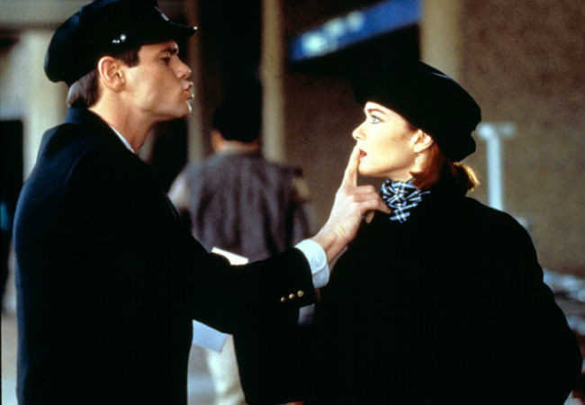 Lloyd Christmas (jim Carrey) and Mary Swanson (Holly Hunter) share a love than can never be and which truth be told, only exists in Lloyd's overactive fantasies (image via Digital Spy)