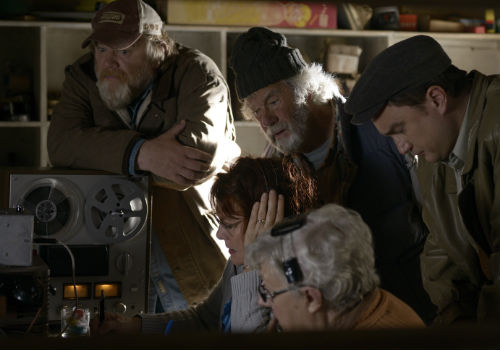 The townspeople of Tickle Head do everything in their power to convince the good doctor to stick around, including gathering intel from his phone conversations to people back home (image via vvcnetwork.ca)