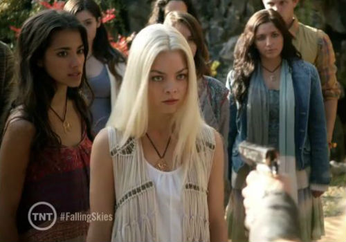 Lexi and Lourdes are shocked to see Maggie's gun, the presence which Lexi warns her could bring their whole sanctuary house of cards crashing down upon them; bluff or not, Maggie isn't taking any chances and lowers her weapon but you have wonder just what is Miss Hybrid 2014 up to exactly? (image via Comicbook (c) TNT)