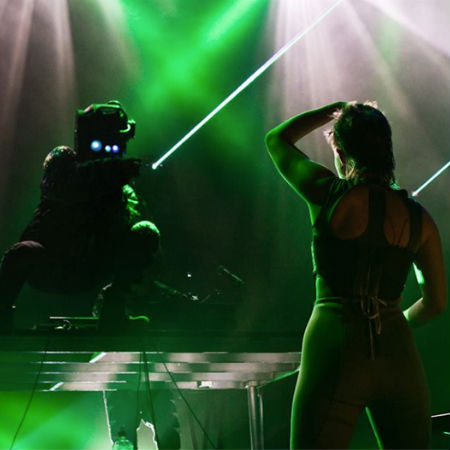Robyn in concert (image via Robyn official Facebook page)