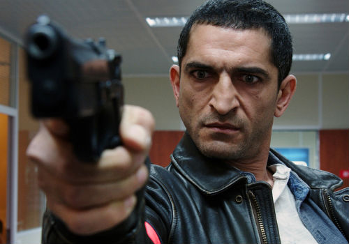 You can't blame Parisian police detective Del Rio for looking a little (or a lot) surprised; what he witnesses when he is with Lucy is beyond the experience of human experience to date ... and that, in Besson's wildly surrealistic style, is exactly the point (image via official Lucy site)