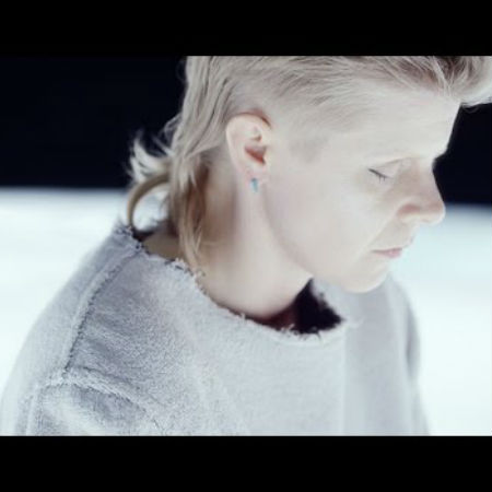 Robyn is suitably introspective mode in the spaced-out video she and Röyksopp made for their epic pop gem "Monument" (image via YouTube)