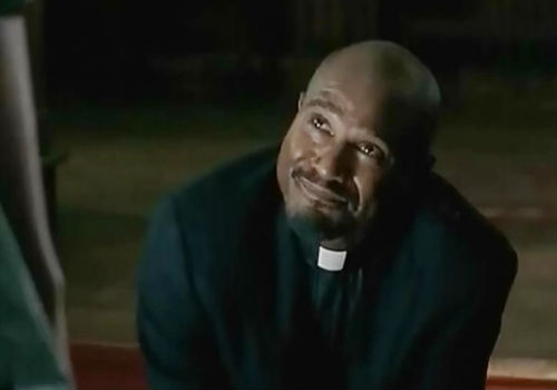 Teetering, nay falling headlong into the abyss of insanity, or at the very least severe emotional distress, Father Gabriel takes at one point to scratching off the blood of Gareth's slaughtered Terminites with his fingernails (image (c) Gene Ward/AMC via Crave Online)