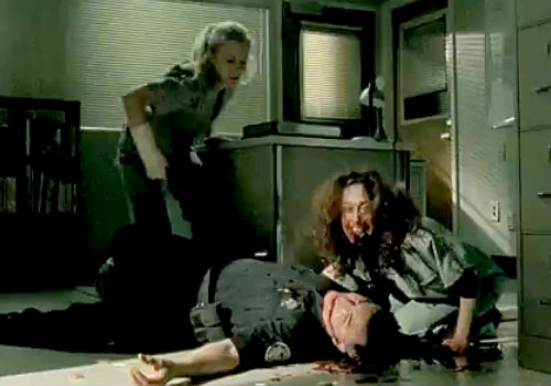 "Mmmm scumbag police officer, my favourite kind!" Joan is a deliberate assassin , driving to literally inhuman means to wreak her revenge of a broken and cruel system which does little to save those who enter it beyond keeping them alive (image via The Geekiary (c) AMC)