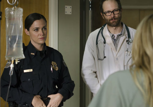 It's case of Bad Cop, Good-ish Doctor when Beth awakes in a hospital room, uncertain of where she is, what's been done to her, and who is responsible from spiriting her away from daryl (Image via Geek Nation (c) AMC)