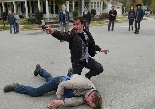 "I'm mad as hell and not going to take it anymore! ... wait no, I'm just as mad as I always was and ... no, wait ... dang it, I HAVE A BRAIN AND I KNOW EVERYTHING!" *cue Michonne to come in and take him down, which she did most effectively* (Photo by Gene Page/AMC)
