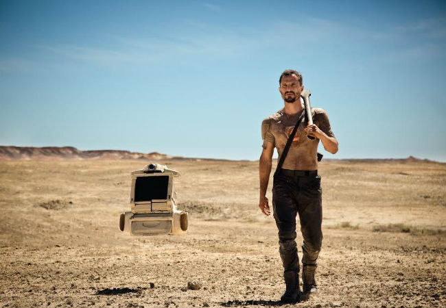 Kye (Dan Mor) does his best to survive against a multitude of threats including, most unnervingly, himself, with the help of RE3F (voiced by Australian actor Shaun Micallef. (image via c|net (c) Jesse O'Brien)