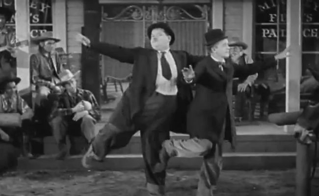 Laurel and Hardy dance to Morrissey in a scene from Way Out West (image via Vimeo)