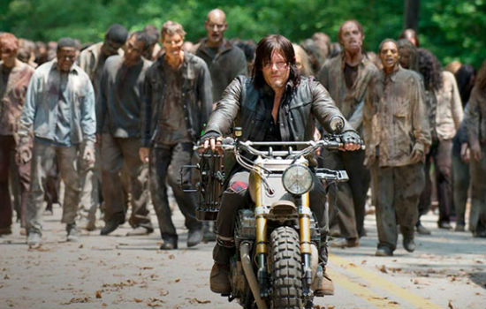 While getting them organised everyday was a lot of work, Daryl took a certain pleasure in taking his pet walkers out for a stroll each day on the nearby country roads (image via Zeibiz (c) AMC)