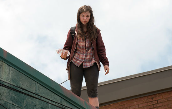 Voted Most Accurate Representative of a Pissed-off Teenager in the Apocalypse 1 year in a row by the residents of Alexandria, Enid is tromping her way through the apocalypse, unhappy about EVERYTHING DAMMIT! (Image courtesy AMC)