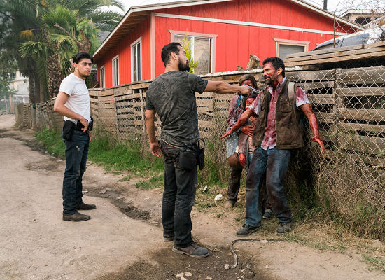 Lost in wistful regret, Antonio wonders why he didn't smear himself in zombie guts when he had the chance (photo courtesy Richard Forman/AMC)