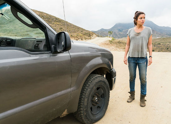 Stopped for some holiday snaps at a particularly part of her journey, Ofelia wonders how it is you get the taste of petrol out of your mouth (photo courtesy Richard Forman/AMC)