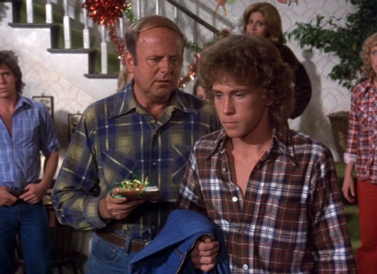 Tommy's grieving is the most visible but he is not alone in his loss (image via Christmas TV History (c) Warner Bros)